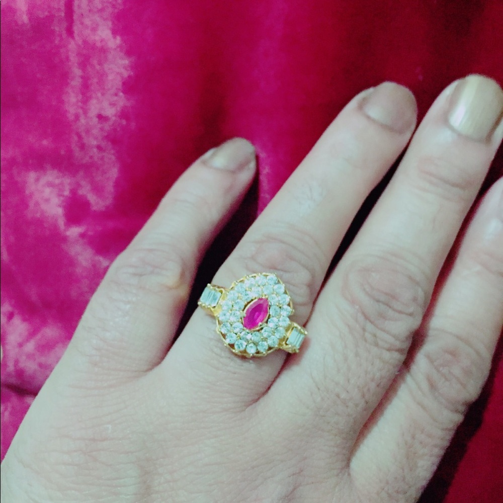 Stunning ring with ruby and Zirconia